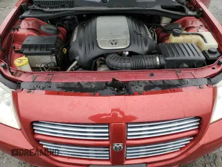 2006 Dodge Magnum z VIN 2D8GZ57226H348199, wystawiony jako Copart lot #57890235 z przebiegiem 205 057 mil mil oraz Tytuł czysty. Historia ofert i sprzedaży dostępna na DreamBid. Obrazek 11.