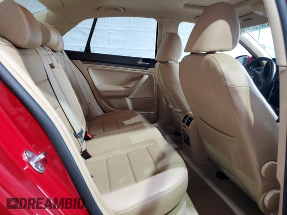 2009 Volkswagen Jetta SE z VIN 3VWRZ71K69M011873, wystawiony jako Copart lot #52881525 z przebiegiem 154 441 mil mil oraz Szkoda całkowita • Salvage title. Historia ofert i sprzedaży dostępna na DreamBid. Obrazek 10.
