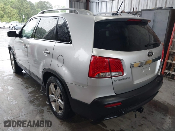 2013 Kia Sorento EX with VIN 5XYKU4A20DG313084, listed as a IAAI auction lot 41976552 with 168,397 mi miles and . Bid and sale history available at carsss.com. Image 3.