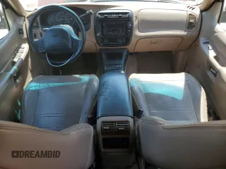 1999 Ford Explorer XLT with VIN 1FMZU32E7XZA41913, listed as a Copart auction lot 50699425 with 210,163 mi miles and Clean title. Bid and sale history available at DreamBid. Image 8.