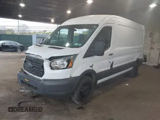 2015 Ford Transit Cargo z VIN 1FTNR2CM1FKA40154, wystawiony jako IAAI lot #42210986 z przebiegiem 164 324 mil mil oraz . Historia ofert i sprzedaży dostępna na DreamBid. Obrazek 17.