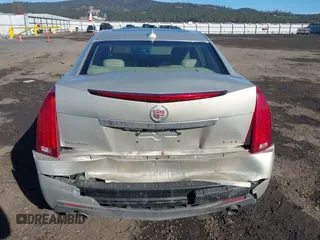 2009 Cadillac CTS AWD z VIN 1G6DT57V990107958, wystawiony jako IAAI lot #41685415 z przebiegiem 148 294 mil mil oraz . Historia ofert i sprzedaży dostępna na DreamBid. Obrazek 17.