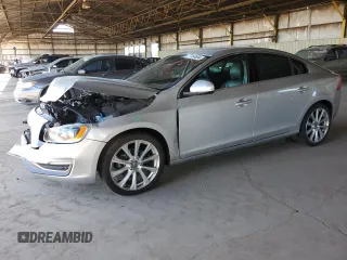 2018 Volvo S60 Inscription with VIN LYV402HK6JB179796, listed as a Copart auction lot 77164694 with 105,595 mi miles and Salvage Title. Bid and sale history available at carsss.com. Image 1.