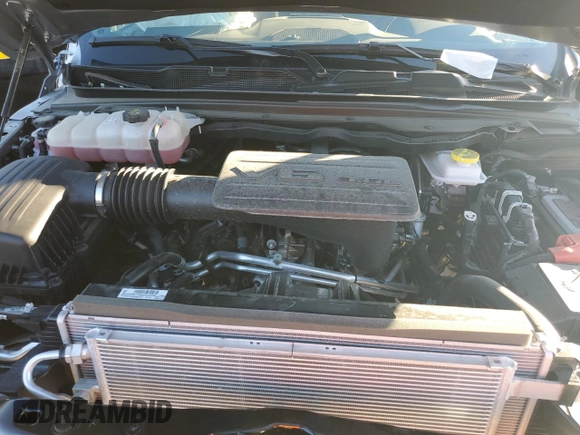 2025 Ram 1500 Big Horn with VIN 1C6RREFG2SN530885, listed as a Copart auction lot 87261914 with 3,814 mi miles and Salvage title. Bid and sale history available at DreamBid. Image 11.