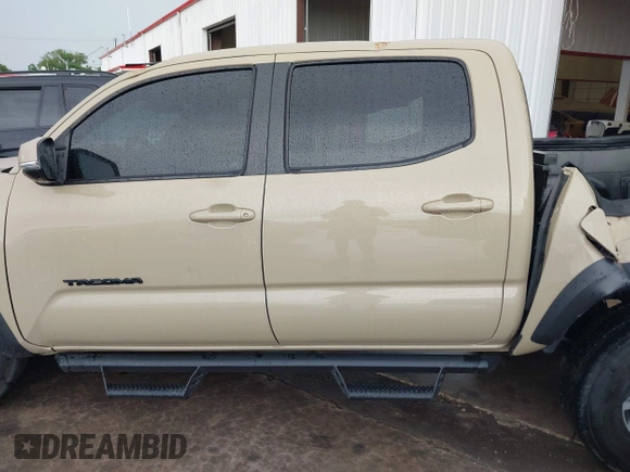 2020 Toyota Tacoma SR5 with VIN 5TFCZ5AN7LX231676, listed as a IAAI auction lot 42596728 with 101,362 mi miles and . Bid and sale history available at DreamBid. Image 14.