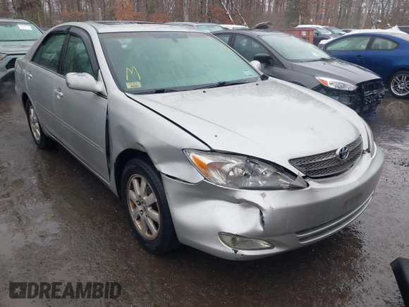 2004 Toyota Camry LE with VIN 4T1BF30K14U578385, listed as a IAAI auction lot 41547709 with 217,434 mi miles. Bid and sale history available at carsss.com. Image 1.