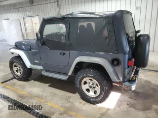 2001 Jeep Wrangler SE with VIN 1J4FA29P31P357744, listed as a Copart auction lot 45743275 with 188,045 mi miles and Salvage Title. Bid and sale history available at carsss.com. Image 2.