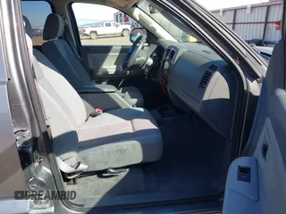 2005 Dodge Dakota SLT with VIN 1D7HW48N25S133725, listed as a IAAI auction lot 42074588 with 163,090 mi miles. Bid and sale history available at carsss.com. Image 5.