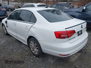 2015 Volkswagen Jetta Sedan 1.8T SE with VIN 3VWD17AJ6FM237674, listed as a IAAI auction lot 41613054 with 71,325 mi miles. Bid and sale history available at carsss.com. Image 3.