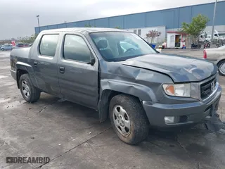 2011 Honda Ridgeline RT with VIN 5FPYK1F27BB453796, listed as a IAAI auction lot 41126251 with 122,746 mi miles. Bid and sale history available at carsss.com. Image 1.