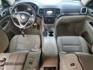 2016 Jeep Grand Cherokee Overland with VIN 1C4RJFCT2GC320247, listed as a Copart auction lot 50832195 with 104,300 mi miles and Salvage title. Bid and sale history available at DreamBid. Image 8.