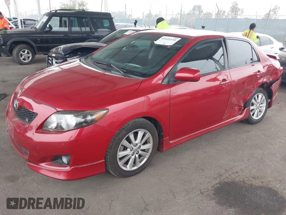 2010 Toyota Corolla with VIN 2T1BU4EE5AC461615, listed as a IAAI auction lot 42455155 with 103,062 mi miles and . Bid and sale history available at DreamBid. Image 2.