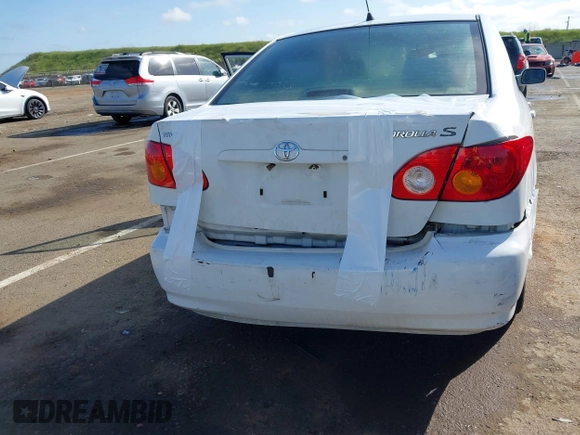 2004 Toyota Corolla CE with VIN JTDBR32E540051928, listed as a IAAI auction lot 41958483 with 299,999 mi miles. Bid and sale history available at carsss.com. Image 6.