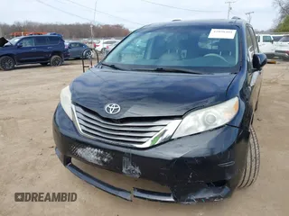 2013 Toyota Sienna XLE with VIN 5TDDK3DC9DS064154, listed as a IAAI auction lot 41898401 with 175,013 mi miles and . Bid and sale history available at DreamBid. Image 2.
