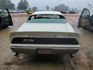 1979 Pontiac Firebird z VIN 2U87K9N120105, wystawiony jako Copart lot #84729164 z przebiegiem 87 739 mil mil oraz Tytuł czysty. Historia ofert i sprzedaży dostępna na DreamBid. Obrazek 6.