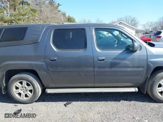 2013 Honda Ridgeline RTS with VIN 5FPYK1F4XDB001703, listed as a IAAI auction lot 41800808 with 146,944 mi miles. Bid and sale history available at carsss.com. Image 13.