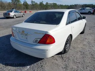 2001 Toyota Avalon XL with VIN 4T1BF28B41U176662, listed as a IAAI auction lot 41740076 with 381,657 mi miles and . Bid and sale history available at carsss.com. Image 4.