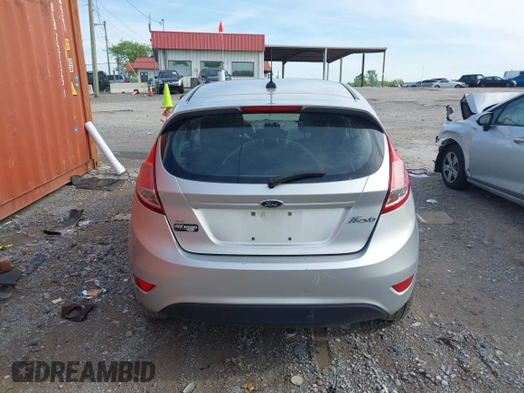 2014 Ford Fiesta SE with VIN 3FADP4EJ0EM215958, listed as a IAAI auction lot 42001168 with 115,231 mi miles and . Bid and sale history available at DreamBid. Image 16.