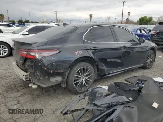 2023 Toyota Camry SE with VIN 4T1T11AK8PU170007, listed as a Copart auction lot 51019605 with 26,932 mi miles and Salvage Title. Bid and sale history available at DreamBid. Image 3.