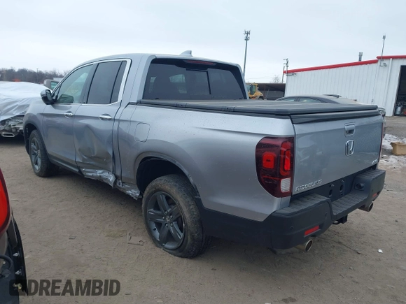 2021 Honda Ridgeline RTL-E with VIN 5FPYK3F79MB010091, listed as a IAAI auction lot 41386318 with 37,996 mi miles and . Bid and sale history available at DreamBid. Image 3.