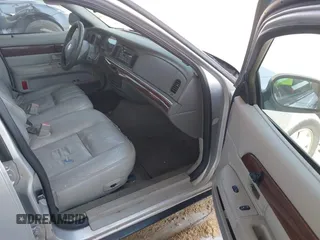 2003 Mercury Grand Marquis LS Premium z VIN 2MEFM75W83X631023, wystawiony jako IAAI lot #42227245 z przebiegiem 114 235 mil mil oraz . Historia ofert i sprzedaży dostępna na DreamBid. Obrazek 5.