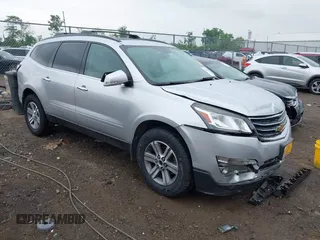 2016 Chevrolet Traverse LT z VIN 1GNKRHKDXGJ115343, wystawiony jako IAAI lot #42246084 z przebiegiem 148 021 mil mil oraz . Historia ofert i sprzedaży dostępna na DreamBid. Obrazek 1.