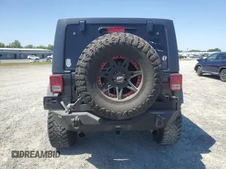 2012 Jeep Wrangler Unlimited Call of Duty MW3 with VIN 1C4BJWFGXCL148883, listed as a Copart auction lot 53162705 with 111,900 mi miles and Salvage title. Bid and sale history available at DreamBid. Image 6.