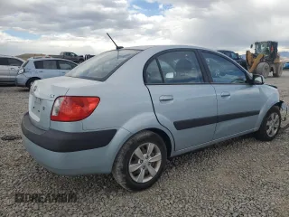 2009 Kia Rio LX with VIN KNADE223496469797, listed as a Copart auction lot 71005774 with 130,675 mi miles and Salvage Title. Bid and sale history available at carsss.com. Image 3.