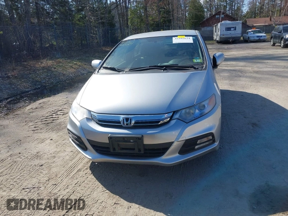 2013 Honda Insight EX z VIN JHMZE2H70DS005200, wystawiony jako IAAI lot #42105624 z przebiegiem 108 949 mil mil oraz . Historia ofert i sprzedaży dostępna na DreamBid. Obrazek 13.