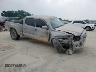 2021 Toyota Tacoma SR5 with VIN 3TMDZ5BN4MM105639, listed as a Copart auction lot 56948395 with Not provided miles and Salvage title. Bid and sale history available at DreamBid. Image 4.