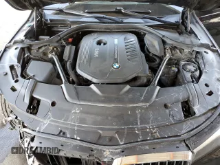 2016 BMW 7 Series 740i z VIN WBA7E2C55GG547282, wystawiony jako Copart lot #57740095 z przebiegiem Nie podano mil oraz Szkoda całkowita • Salvage title. Historia ofert i sprzedaży dostępna na DreamBid. Obrazek 11.