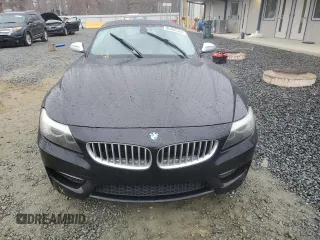 2011 BMW Z4 sDrive35is with VIN WBALM1C59BE633291, listed as a Copart auction lot 86403324 with 98,268 mi miles and Salvage Title. Bid and sale history available at carsss.com. Image 5.