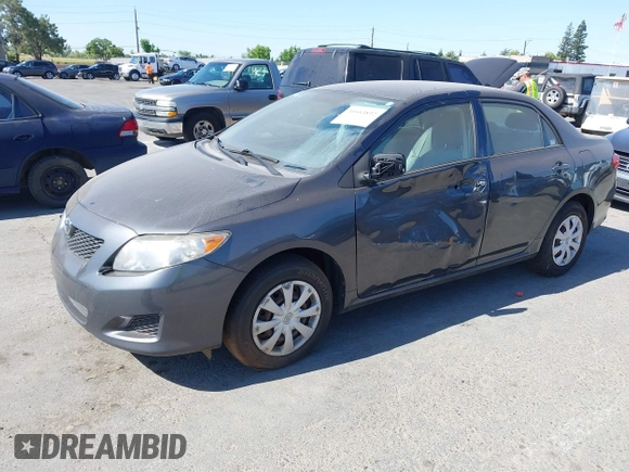 2009 Toyota Corolla with VIN 1NXBU40E99Z108425, listed as a IAAI auction lot 39553892 with 208,165 mi miles and . Bid and sale history available at DreamBid. Image 2.