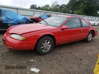 1996 Ford Thunderbird LX with VIN 1FALP62W8TH174603, listed as a Copart auction lot 72928574 with 153,614 mi miles and Salvage Title. Bid and sale history available at DreamBid. Image 1.