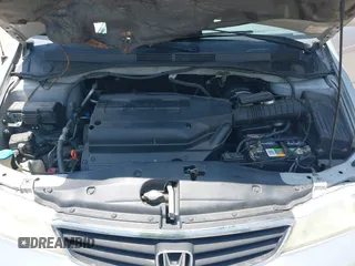 2004 Honda Odyssey EX-L with VIN 5FNRL18774B028164, listed as a IAAI auction lot 42454877 with 135,720 mi miles and . Bid and sale history available at DreamBid. Image 10.