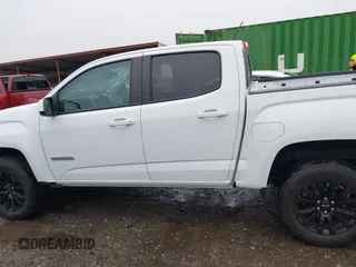 2022 GMC Canyon 4WD Elevation z VIN 1GTG6CEN1N1330671, wystawiony jako IAAI lot #41227361 z przebiegiem 24 579 mil mil oraz . Historia ofert i sprzedaży dostępna na DreamBid. Obrazek 14.