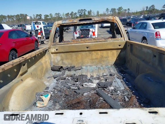 2014 Chevrolet Silverado 1500 Work Truck with VIN 1GCNCPEH0EZ272958, listed as a IAAI auction lot 41801400 with 130,363 mi miles and . Bid and sale history available at DreamBid. Image 8.