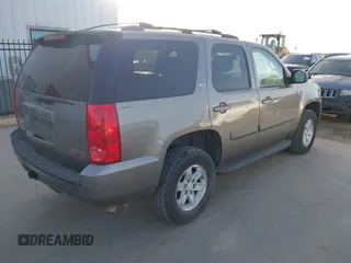 2008 GMC Yukon SLT w/4SB with VIN 1GKFK13078R227526, listed as a IAAI auction lot 41830004 with 143,728 mi miles. Bid and sale history available at carsss.com. Image 4.