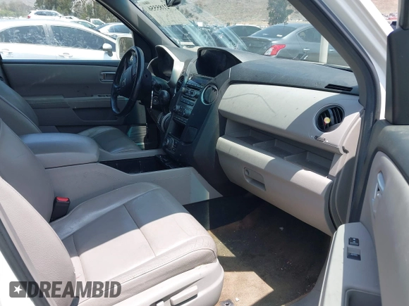 2013 Honda Pilot Touring with VIN 5FNYF3H93DB017954, listed as a IAAI auction lot 42185556 with 174,929 mi miles and . Bid and sale history available at carsss.com. Image 5.