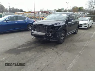 2016 Infiniti QX60 with VIN 5N1AL0MM0GC506599, listed as a IAAI auction lot 41921886 with 113,821 mi miles. Bid and sale history available at carsss.com. Image 2.