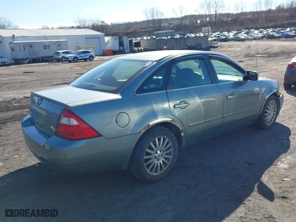 2005 Mercury Montego Premier with VIN 1MEFM42165G618285, listed as a IAAI auction lot 41595913 with 127,811 mi miles. Bid and sale history available at carsss.com. Image 4.