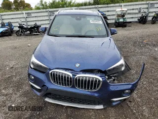 2018 BMW X1 sDrive28i with VIN WBXHU7C33J3F04439, listed as a Copart auction lot 45034033 with 28,091 mi miles. Bid and sale history available at carsss.com. Image 5.