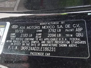 2020 Kia Forte LXS with VIN 3KPF24AD2LE186231, listed as a IAAI auction lot 41972941 with 65,415 mi miles and . Bid and sale history available at carsss.com. Image 9.