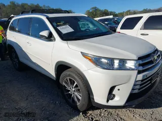 2019 Toyota Highlander SE with VIN 5TDJZRFH0KS571466, listed as a IAAI auction lot 41822970 with 57,639 mi miles. Bid and sale history available at carsss.com. Image 1.