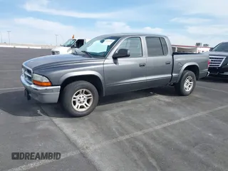 2003 Dodge Dakota SLT with VIN 1D7HL48N93S190381, listed as a IAAI auction lot 41921335 with 75,088 mi miles. Bid and sale history available at carsss.com. Image 2.
