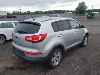 2012 Kia Sportage LX with VIN KNDPBCA25C7280598, listed as a IAAI auction lot 42223042 with 147,507 mi miles and . Bid and sale history available at DreamBid. Image 4.