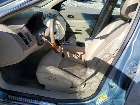 2007 Cadillac STS z VIN 1G6DW677270181170, wystawiony jako Copart lot #47137165 z przebiegiem Nie podano mil oraz Szkoda całkowita • Salvage title. Historia ofert i sprzedaży dostępna na DreamBid. Obrazek 7.