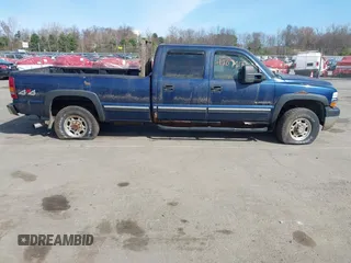 2002 Chevrolet Silverado 2500HD LS with VIN 1GCHK23U52F128404, listed as a IAAI auction lot 42079138 with 153,613 mi miles. Bid and sale history available at carsss.com. Image 13.