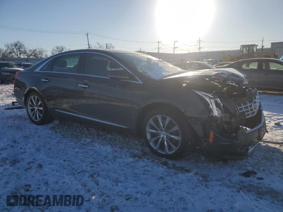 2014 Cadillac XTS with VIN 2G61L5S37E9185986, listed as a Copart auction lot 45142685 with 61,940 mi miles and Salvage Title. Bid and sale history available at carsss.com. Image 4.