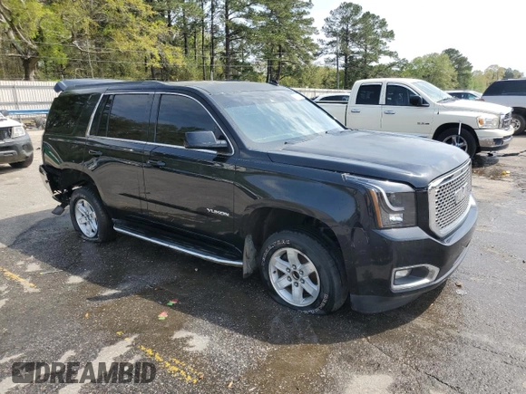 2015 GMC Yukon SLT with VIN 1GKS1BKC0FR113013, listed as a Copart auction lot 49821495 with 294,596 mi miles and Salvage Title. Bid and sale history available at carsss.com. Image 4.